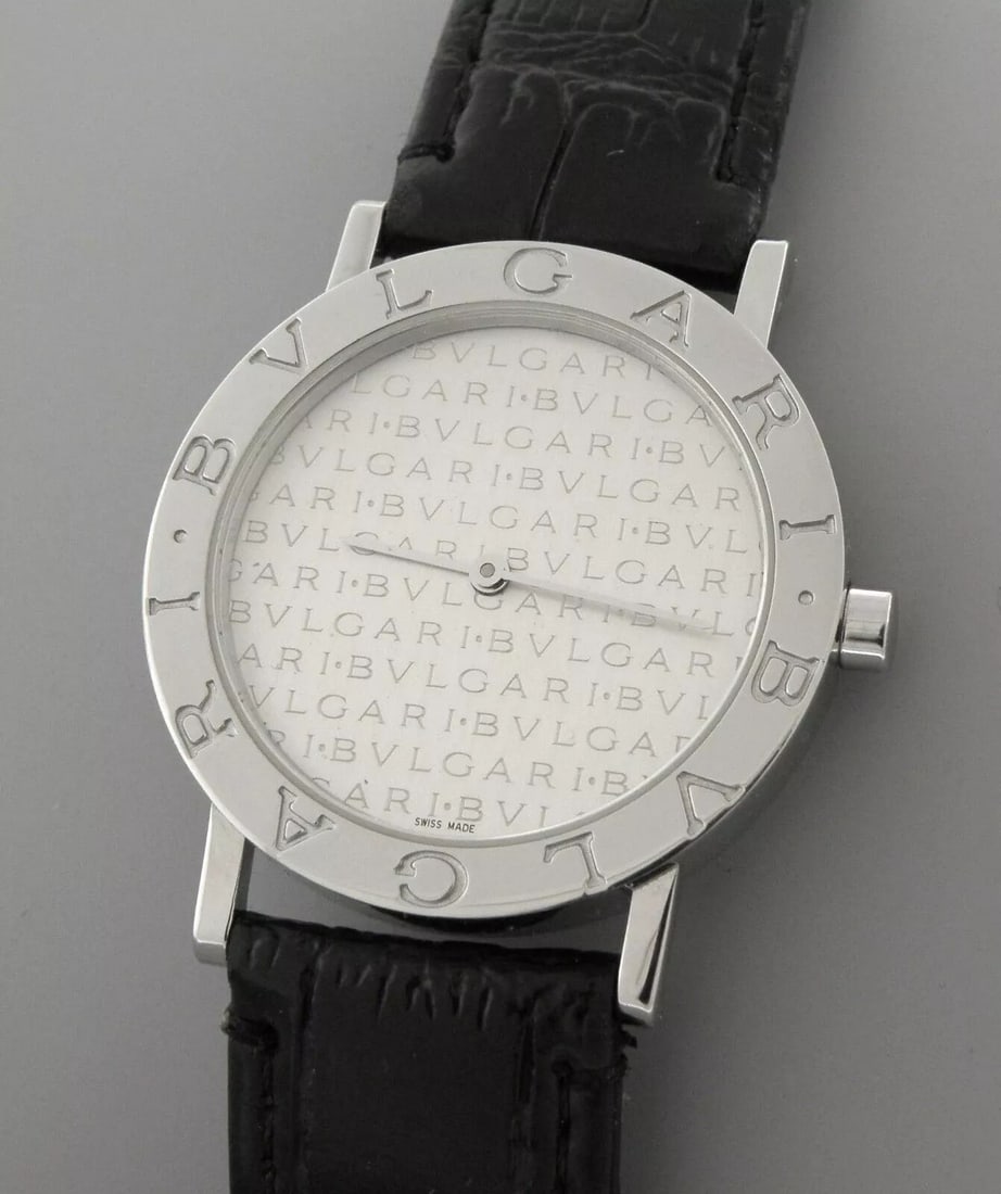 AUTHENTIC BVLGARI LOGO MANIA STAINLESS BB33SL QUARTZ WATCH GOOD CONDITION: BVLGARI STAINLESS STEEL LOGO MANIA WATCH Watch will fit a wrist size upto 8.75" Face measures 33mm wide without crown Pre-owned, in good condition, minor wear to band, band not original, please refer