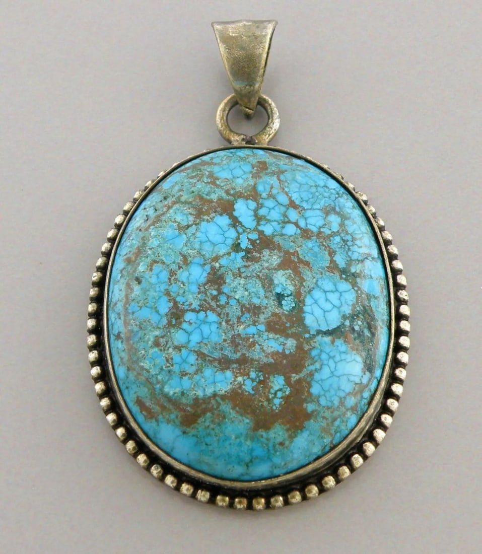 VINTAGE BEAUTIFUL STERLING SILVER LARGE SPIDERWEB TURQUOISE PENDANT: TURQUOISE STERLING SILVER PENDANT Turquoise sterling silver pendant Vintage Sterling silver Spiderweb turquoise pendant Measures 2.07" H x 1.22" W Turquoise measures 1.33" x 1.03" Vintage, Pre-owned,