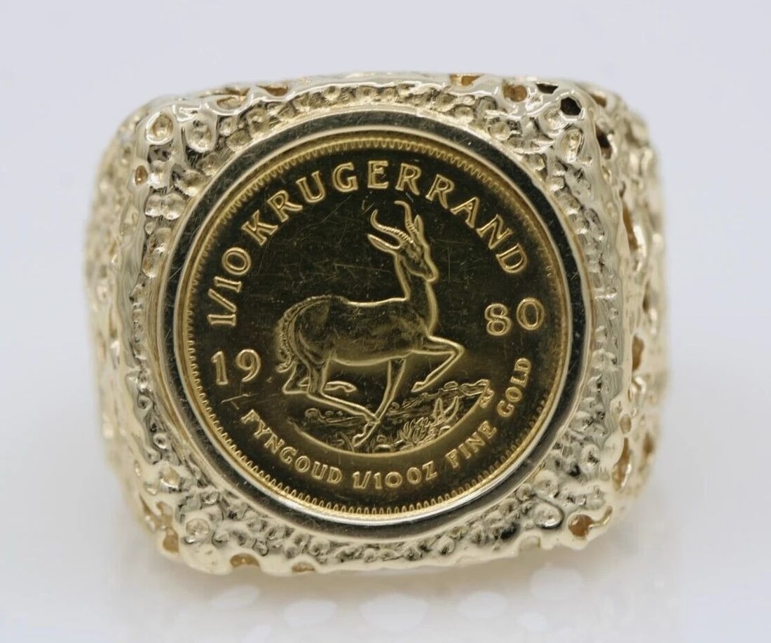 1980 1/10TH KRUGERRAND SOUTH AFRICA COIN 14K YELLOW GOLD RING SIZE 9.5 - 12.5 G: 1980 1/10TH KRUGERRAND SOUTH AFRICA COIN 14K YELLOW GOLD RING SIZE 9.5 - 12.5 G Description 1980 1/10th Krugerrand South Africa Coin 14K Yellow Gold Nugget Mens Ring Size 9.5 - 12.5 Coin/ring is in go
