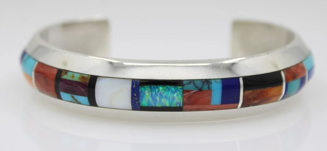 WILFORD CHEE NAVAJO STERLING SILVER MULTICOLOR STONE INLAY CUFF BRACELET 6.5": WILFORD CHEE NAVAJO STERLING SILVER MULTICOLOR STONE INLAY CUFF BRACELET 6.5" WILFORD CHEE NAVAJO STERLING SILVER MULTICOLOR STONE INLAY CUFF BRACELET 6.5" Description Wilford Chee Navajo Sterling Sil
