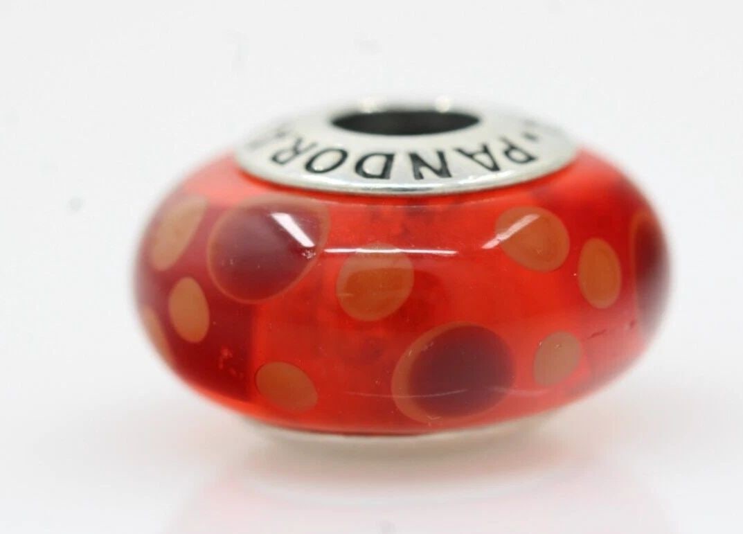 GENUINE PANDORA STERLING SILVER RED BUBBLES MURANO GLASS CHARM 790690: GENUINE PANDORA STERLING SILVER RED BUBBLES MURANO GLASS CHARM 790690 Description Genuine Pandora Sterling Silver Red Bubbles Murano Glass Charm 790690 Pandora charm is in good condition. May show sig