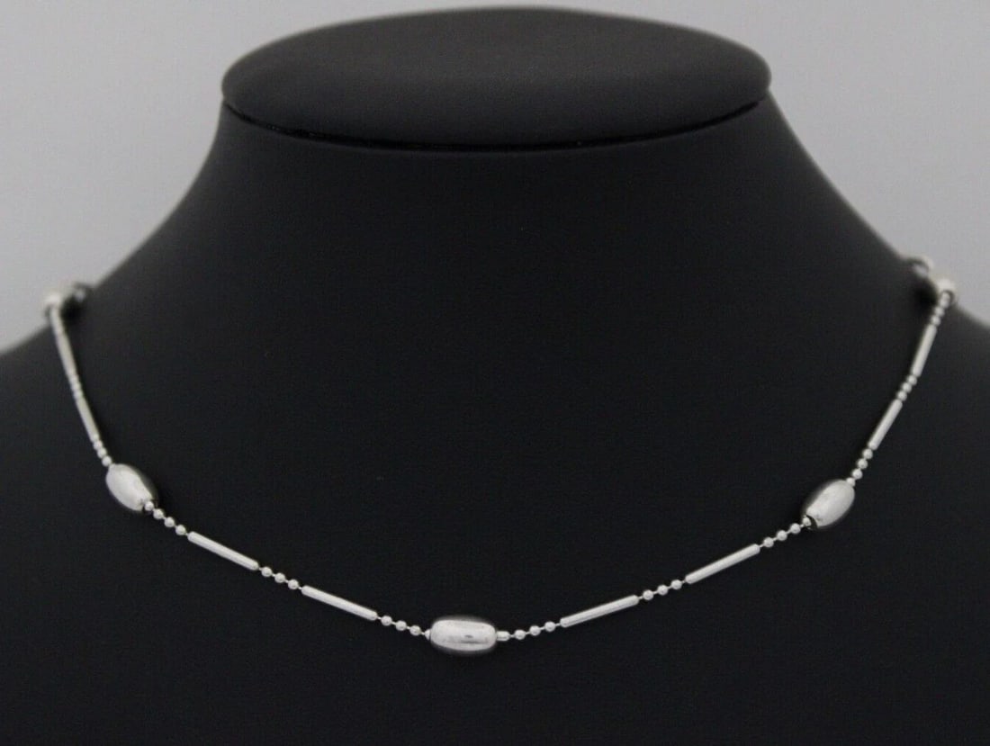 STERLING SILVER ITALY 5MM BEAD BAR LINK 16" NECKLACE 6.2 GRAMS: STERLING SILVER ITALY 5MM BEAD BAR LINK 16" NECKLACE 6.2 GRAMS Description Sterling Silver Italy 5mm Bead Bar Link 16" Necklace Necklace is in great condition. May show signs of wear and/or tear. Appr
