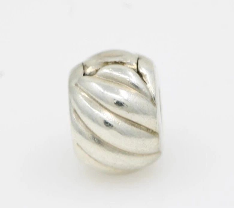 AUTHENTIC PANDORA STERLING SILVER FEATHERED CLIPS CHARM 791752: AUTHENTIC PANDORA STERLING SILVER FEATHERED CLIPS CHARM 791752 Description Authentic Pandora Sterling Silver Feathered Clips Charm 791752 "Two charms available. One charm per purchase price." Pandora