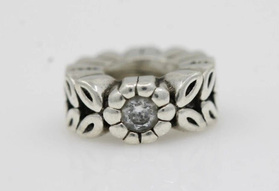 PANDORA STERLING SILVER TWICE AS NICE SPACER W/ CLEAR STONE 791224: PANDORA STERLING SILVER TWICE AS NICE SPACER W/ CLEAR STONE 791224 Description Pandora Sterling Silver Twice as Nice Spacer w/ Clear Stone 791224 "Two charms available. One charm per purchase price."