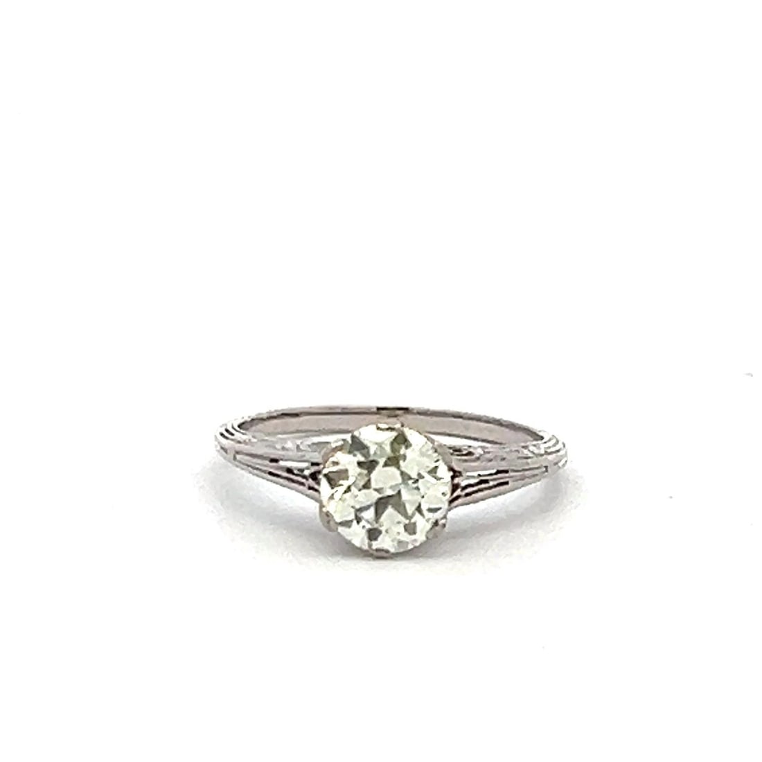 0.89 CARAT CIRCULAR BRILLIANT CUT N SI1 DIAMOND PLATINUM ENGAGEMENT RING (1 of 2)