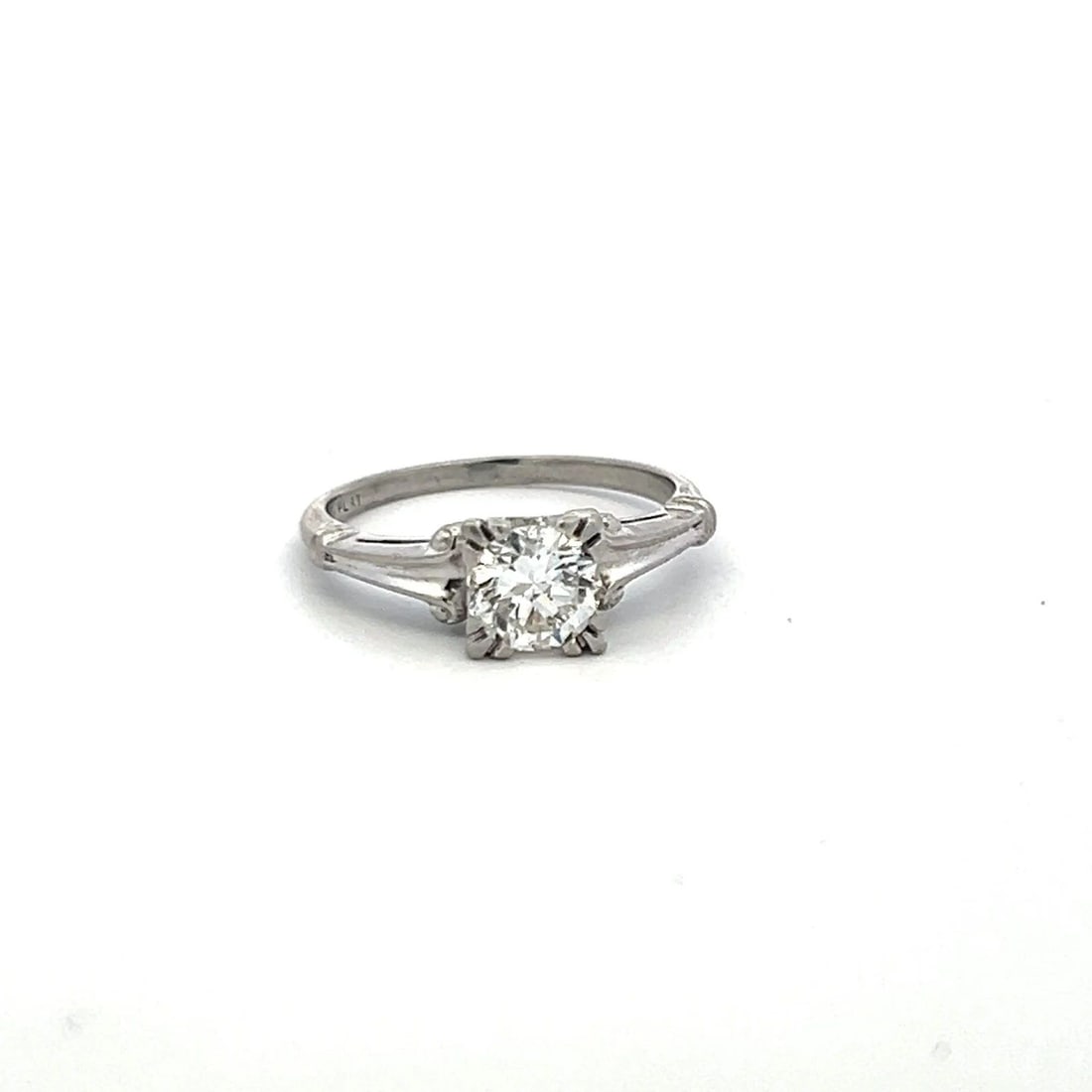 0.75CT ROUND BRILLIANT DIAMOND PLATINUM ENGAGEMENT RING – H VS VINTAGE SOLITAIRE: 0.75CT ROUND BRILLIANT DIAMOND PLATINUM ENGAGEMENT RING – H VS VINTAGE SOLITAIRE Title: A timeless piece of understated beauty, this vintage platinum engagement ring showcases a 0.75-carat round bri