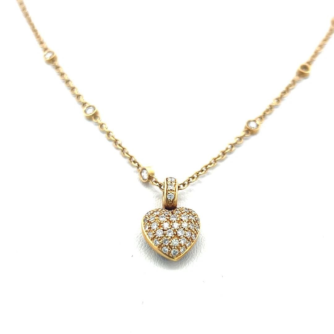 0.54 CARAT ROUND BRILLIANT I SI1 DIAMOND 18 KARAT YELLOW GOLD PENDANT NECKLACE: 0.54 CARAT ROUND BRILLIANT I SI1 DIAMOND 18 KARAT YELLOW GOLD PENDANT NECKLACE PRODUCT DESCRIPTION Title: 0.54 Carat Round Brilliant I SI1 Diamond 18 Karat Yellow Gold Pendant Necklace Style: Pendant