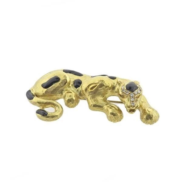 0.10 CARAT ROUND BRILLIANT DIAMOND 18 KARAT YELLOW GOLD LEOPARD PIN: 0.10 CARAT ROUND BRILLIANT DIAMOND 18 KARAT YELLOW GOLD LEOPARD PIN PRODUCT DESCRIPTION Title: 0.10 Carat Round Brilliant Diamond 18 Karat Yellow Gold Pin Metal: 18 Karat Yellow Gold Gemstone 1: 0.1 C