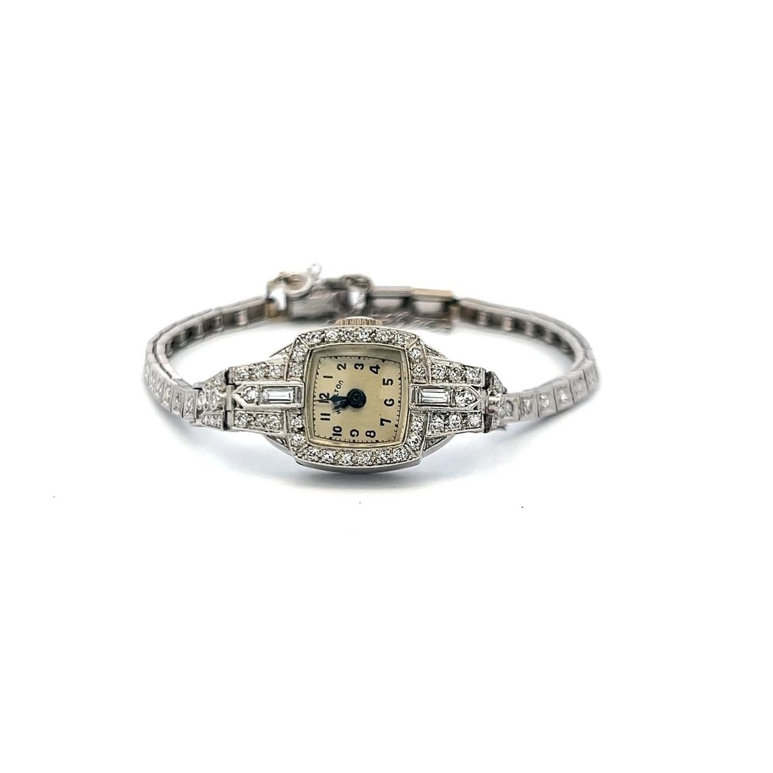 0.88 CARAT CIRCULAR BRILLIANT AND BAGUETTE DIAMOND PLATINUM WRIST WATCH (1 of 2)