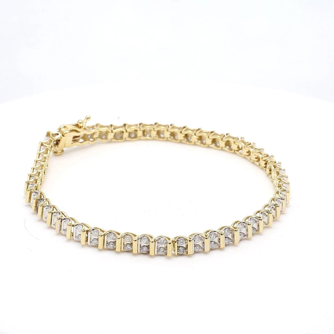 2.00 CARAT ROUND BRILLIANT I SI2 DIAMOND 14 KARAT YELLOW GOLD TENNIS BRACELET: 2.00 CARAT ROUND BRILLIANT I SI2 DIAMOND 14K YG TENNIS BRACELET 2.00 Carat Round Brilliant I SI2 Diamond 14 Karat Yellow Gold Tennis Bracelet 14k Details Department Unisex Adults Main Stone Diamond Me