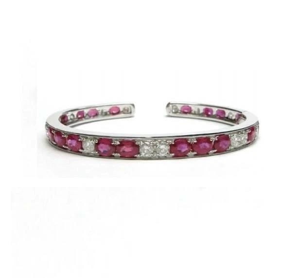 18KT RARE GORGEOUS 10CT RED RUBY DIAMOND BANGLE BRACELET: 18KT RARE GORGEOUS 10CT RED RUBY DIAMOND BANGLE BRACELET The Following Item we are offering is this Rare Important FANCY RED RUBY AND DIAMOND BANGLE BRACELET