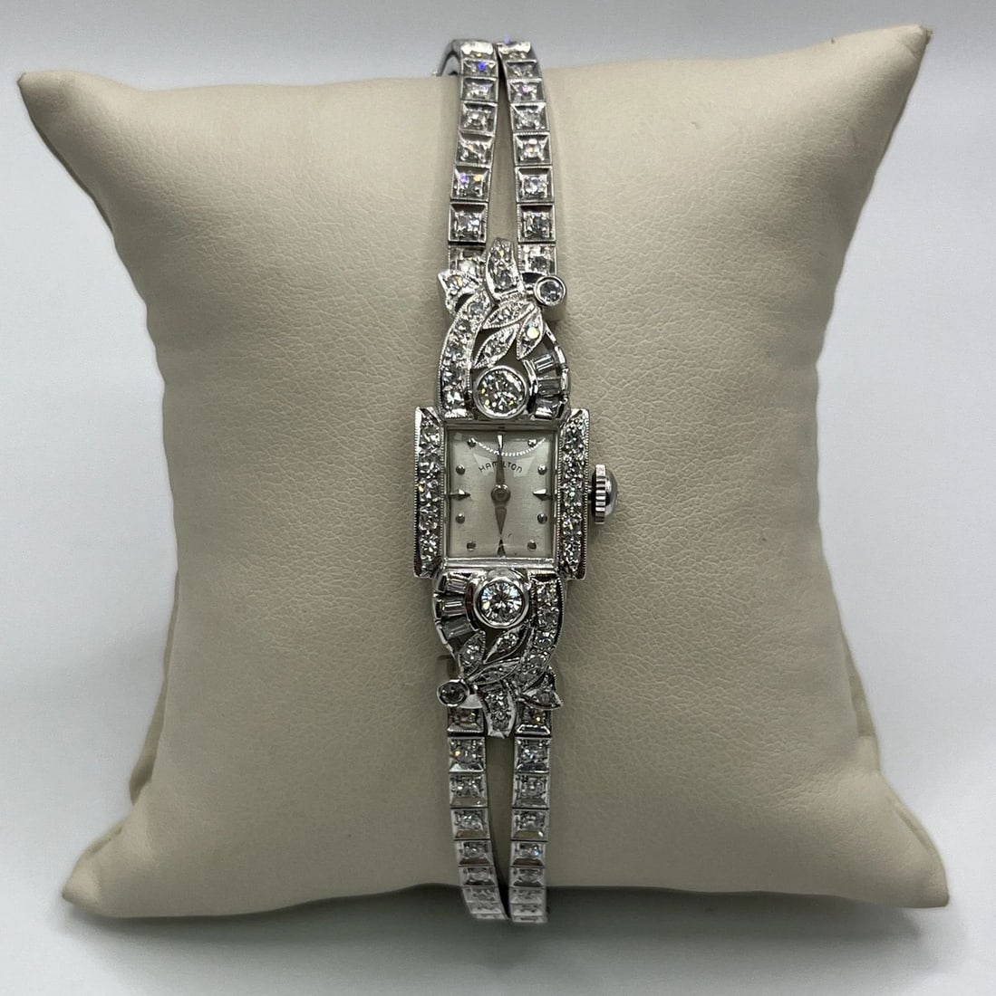 DIAMOND HAMILTON WATCH: DIAMOND HAMILTON WATCH Ladies 14K White Gold and Diamond Hamilton Watch There are 96 sc diamonds = approximately 2.0 ct There are 2 round diamonds = approximately 0.38 ct There are 6 baguette diamonds