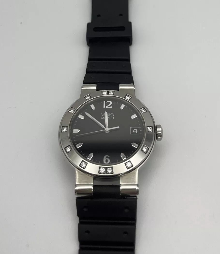 MENS MOVADO VIZIO BLACK FACE WATCH WITH DIAMONDS - STAINLESS STEEL W RIBBER BAND (1 of 2)