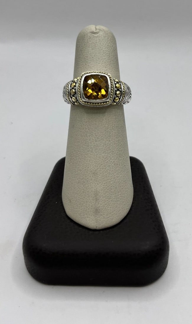 STERLING SILVER WITH 18K GOLD ACCENTS LADIES GEMSTONE RING WITH CITRINE SIZE 7: STERLING SILVER WITH 18K GOLD ACCENTS LADIES GEMSTONE RING WITH CITRINE SIZE 7 Sterling Silver With 18K Gold Accents Ladies Fashion Gemstone Ring With Citrine. Approximate weight is 7.9g Size 7
