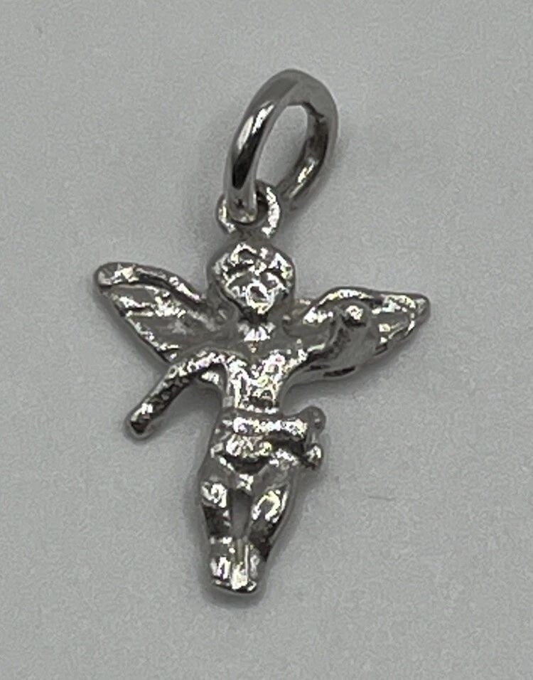 14K WHITE GOLD ANGEL CHARM: 14K WHITE GOLD ANGEL CHARM Add some heavenly charm to your jewelry collection with this stunning 14K white gold angel charm. The charm is beautifully crafted with intricate details and features an ang
