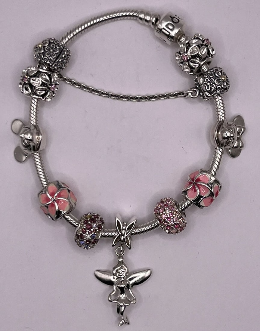PANDORA DISNEY THEMED BRACELET - CHARMS INCLUDED: PANDORA DISNEY THEMED BRACELET - CHARMS INCLUDED Pandora Bracelet Has 11 charms Disney Themed Bracelet