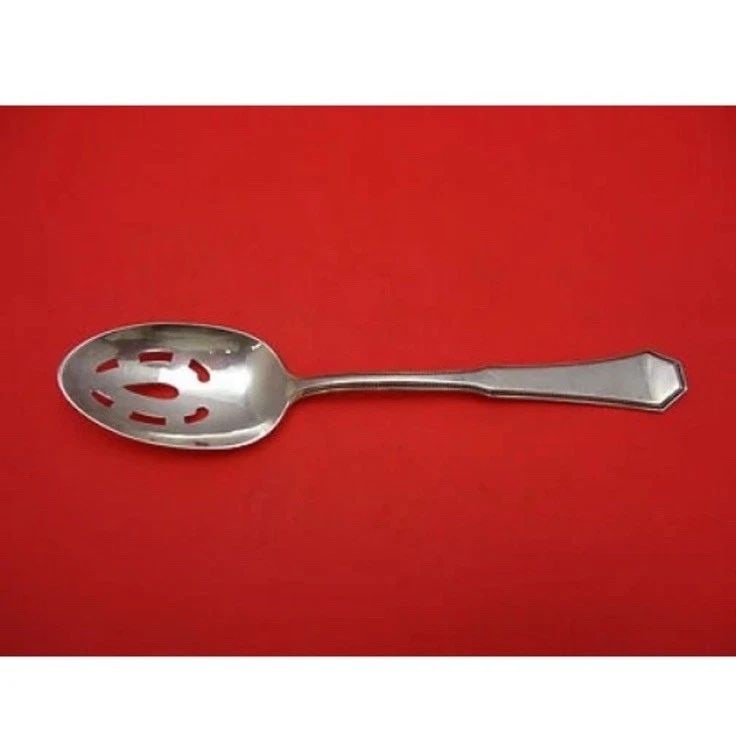 AMERICAN FEDERAL BY REED AND BARTON STERLING SILVER SERVING SPOON PCD ORIG: AMERICAN FEDERAL BY REED AND BARTON STERLING SILVER SERVING SPOON PCD ORIG The American Federal by Reed and Barton Sterling Silver Serving Spoon is a luxurious and elegant piece of flatware. Made from