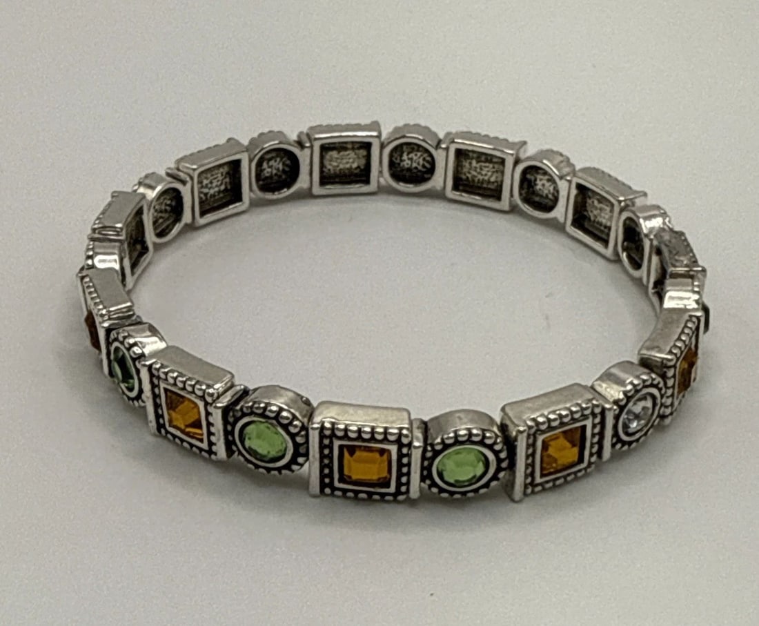 STERLING SILVER STRECH BRACELET WITH GREEN AND ORANGE STONES (1 of 2)