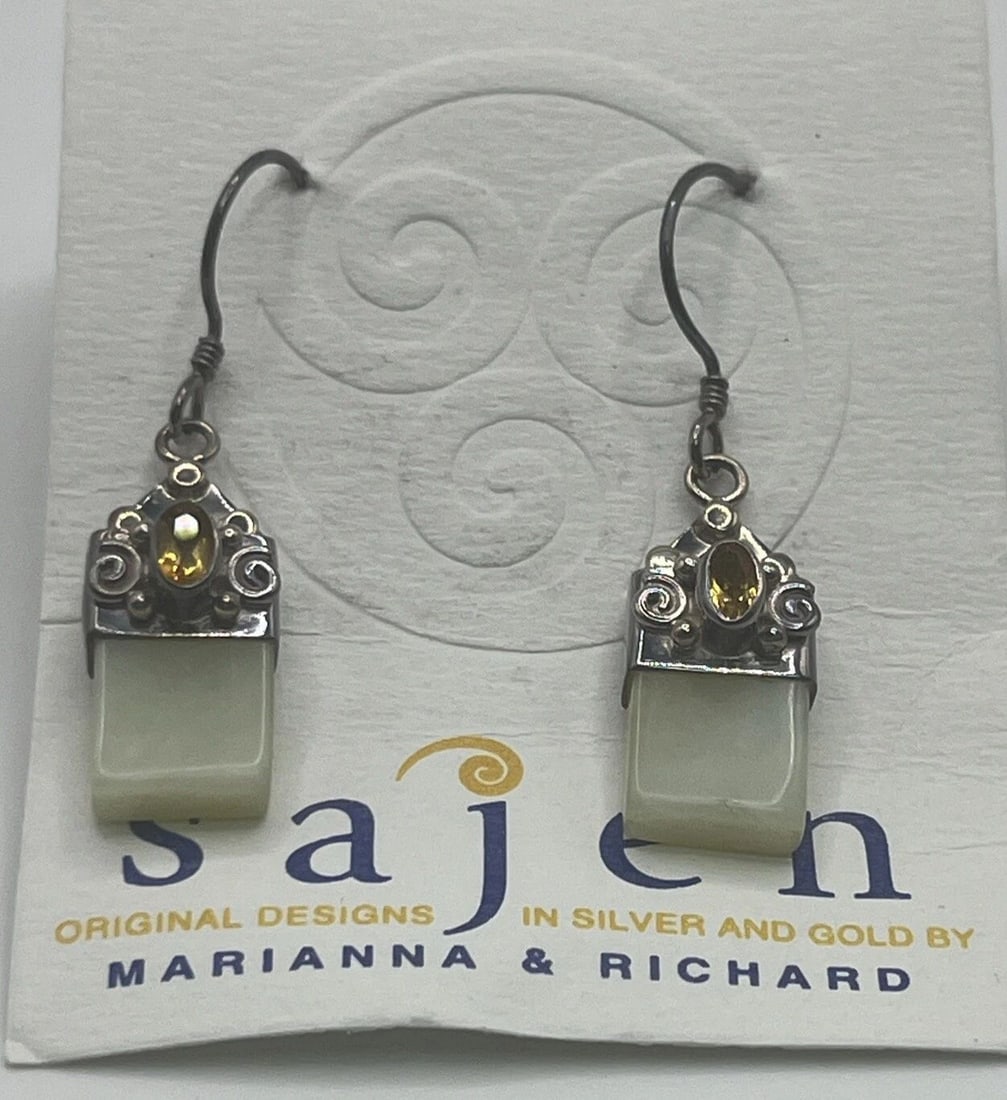 SAJEN STERLING SILVER & MOONSTONE DROP EARRINGS: SAJEN STERLING SILVER & MOONSTONE DROP EARRINGS Elevate your style with these stunning Sajen drop earrings. Crafted from high-quality 925 sterling silver, these earrings are the perfect addition to an