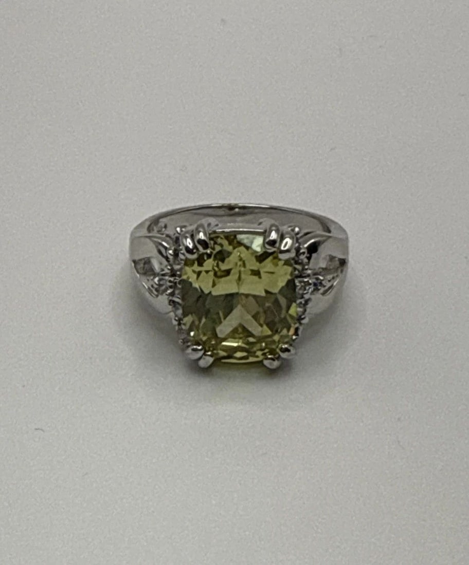 STERLING SILVER SIZE 7 RING WITH YELLOW CENTER STONE & COLORLESS SIDE STONES (1 of 2)