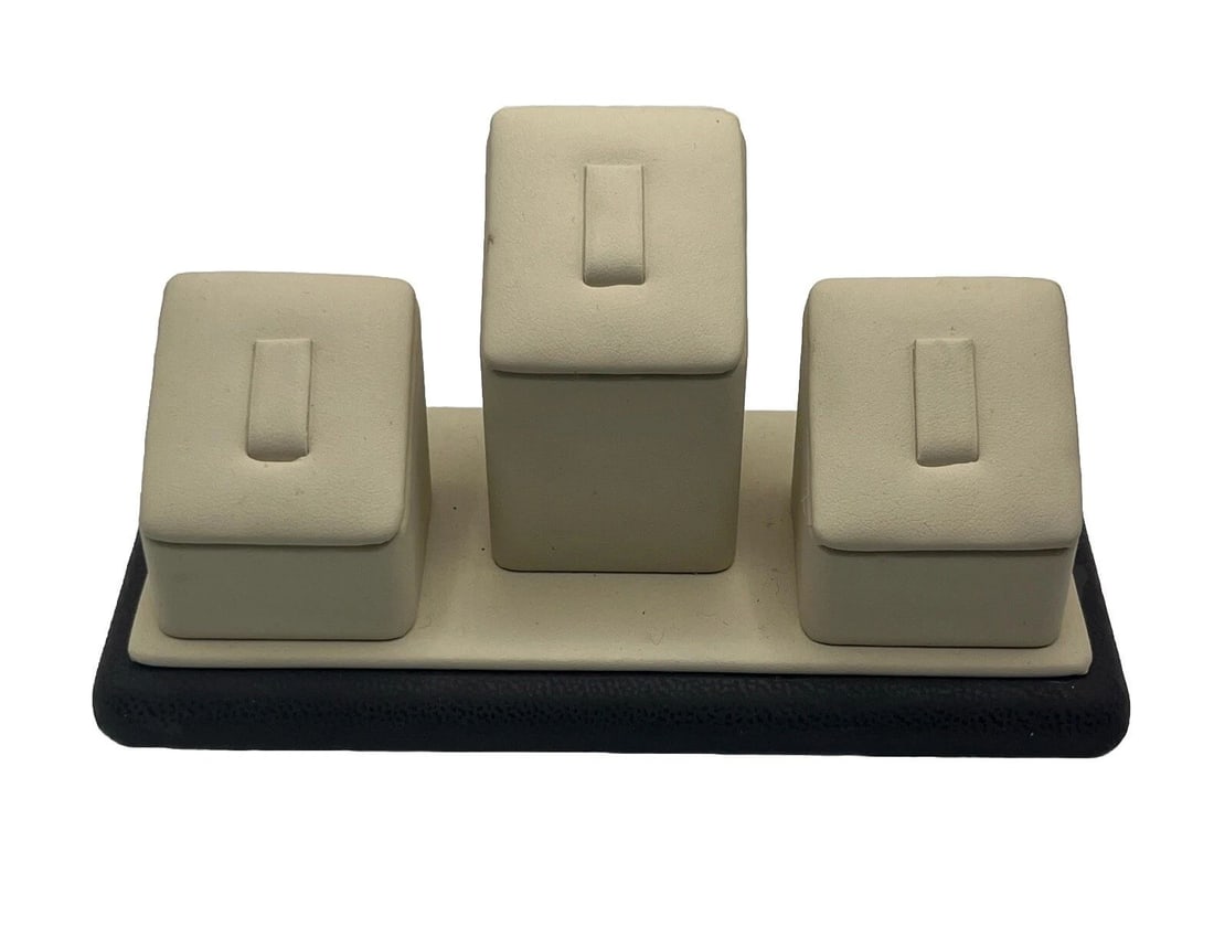 TRIPLE RING DISPLAY UNIT: TRIPLE RING DISPLAY UNIT This jewelry display unit is perfect for showcasing your rings in a stylish and organized way. The triple ring design allows for ample space to display multiple rings, while t