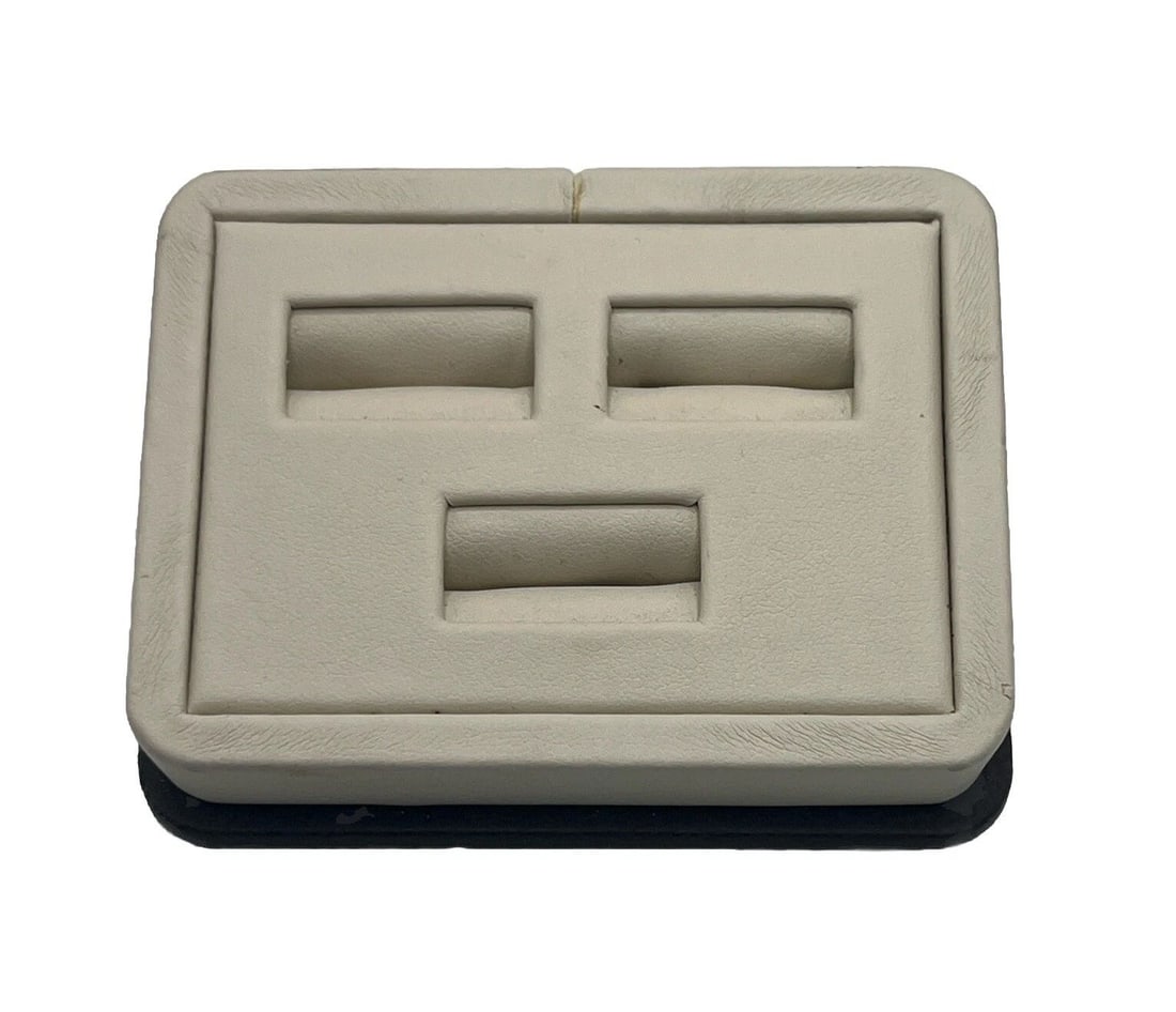 TRIPLE RING DISPLAY UNIT: TRIPLE RING DISPLAY UNIT This jewelry display unit is perfect for showcasing your rings in a stylish and organized way. The triple ring design allows for ample space to display multiple rings, while t