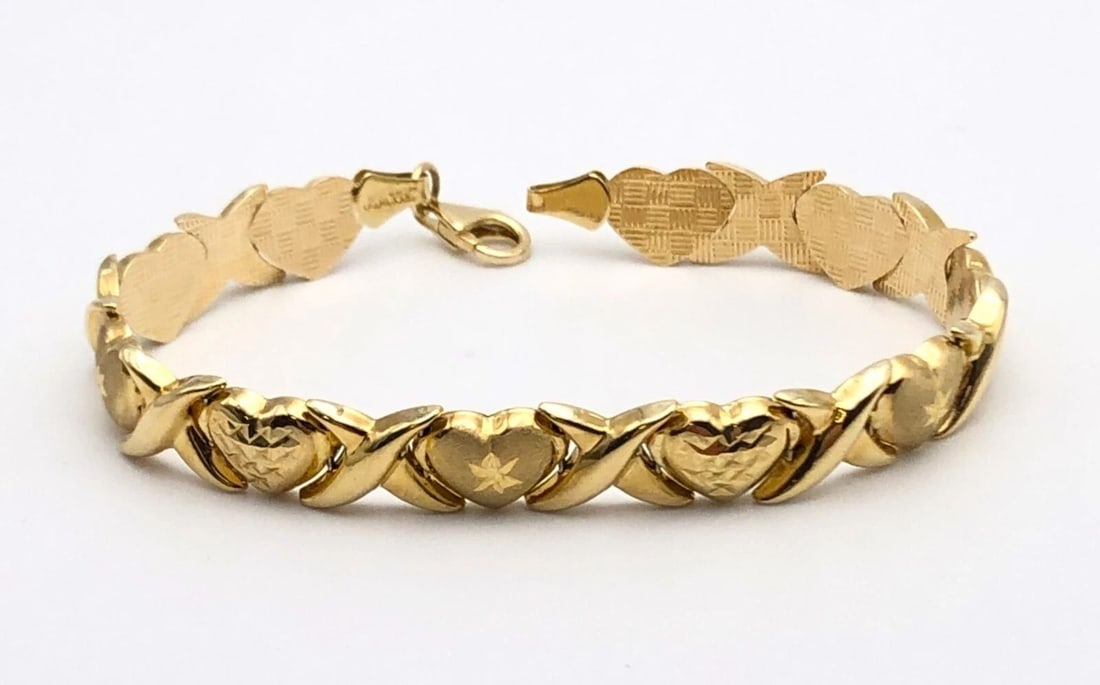 10K GOLD HEART AND CROSS X LINKED BRACELET 7.5" 7.2 GRAMS (1 of 2)