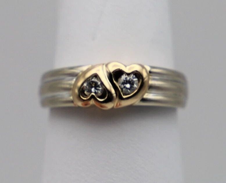 14K TWO TONED GOLD RING WITH DOUBLE HEARTS SET WITH 0.22CT DIAMONDS (SIZE: 7): 14K TWO TONED GOLD RING WITH DOUBLE HEARTS SET WITH 0.22CT DIAMONDS (SIZE: 7) 14k Two Toned Gold Ring with Double Hearts set with 0.22ct Diamonds You are bidding on a 14k Two Toned Gold Ring with