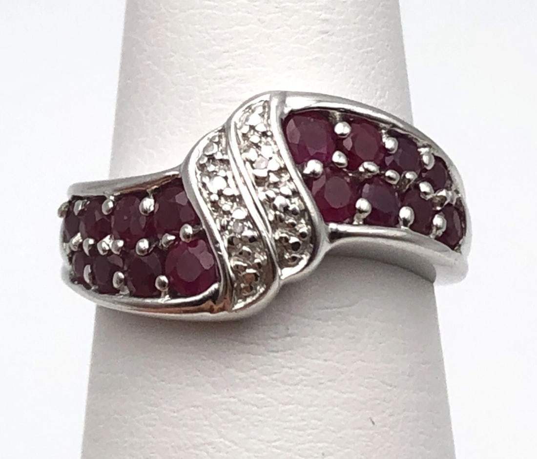 10K WHITE GOLD RING SET WITH NATURAL RUBIES AND 0.02CTS OF DIAMONDS SIZE: 6 (1 of 2)