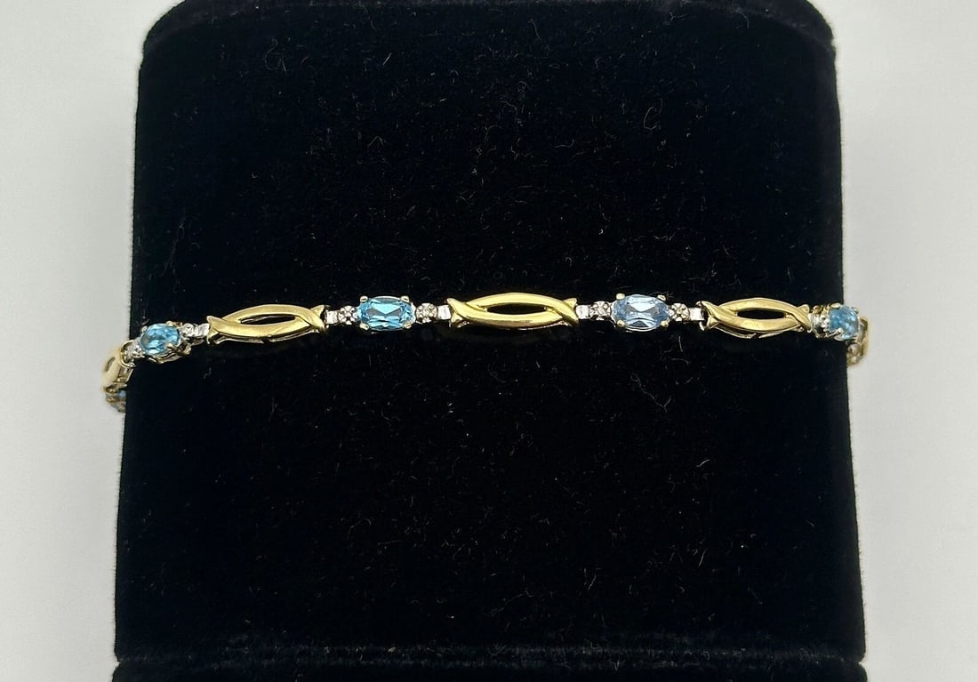 10K GOLD BRACELET WITH BLUE TOPAZ AND 0.01CTS OF DIAMONDS 7.5" 4.1G (1 of 2)