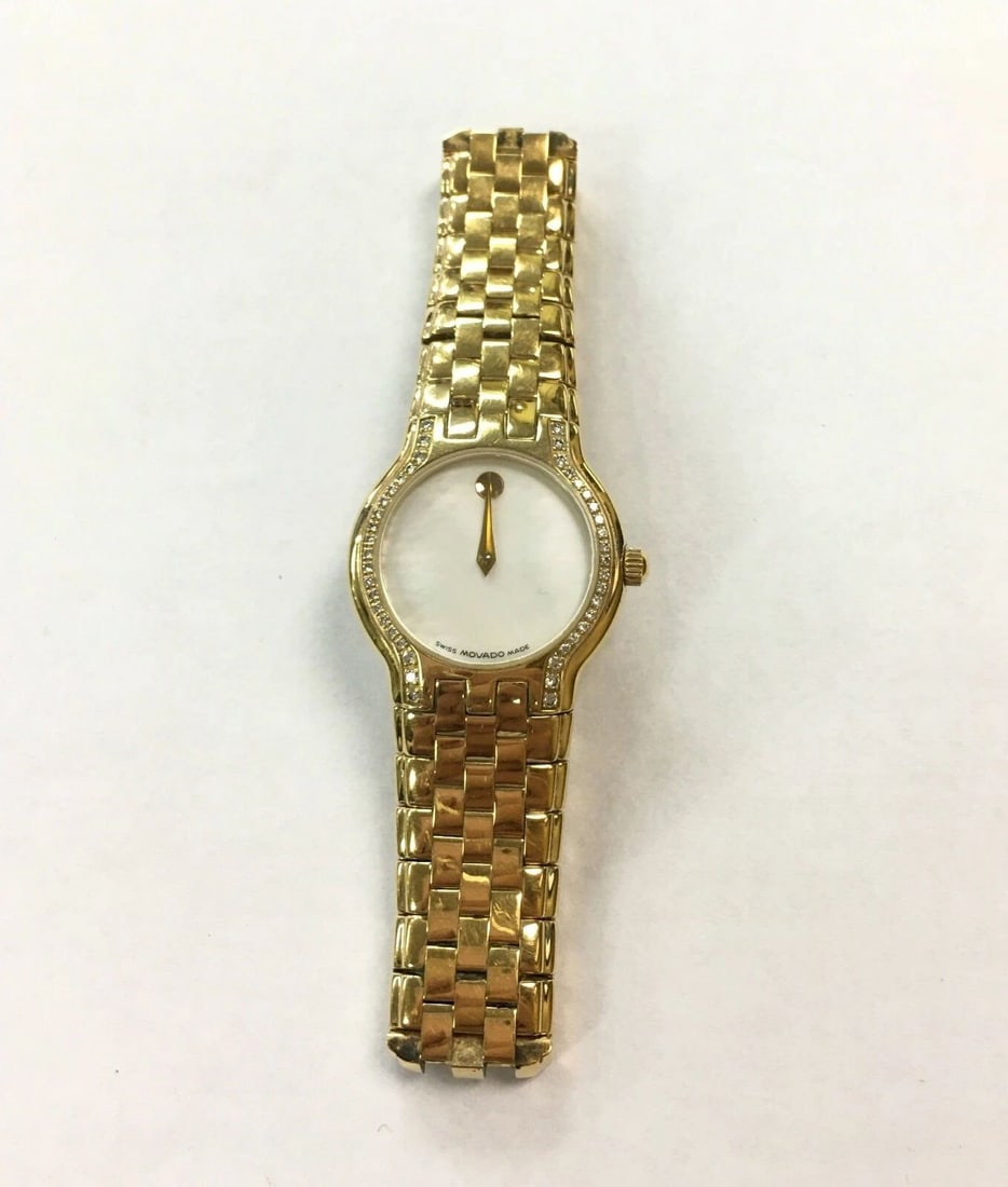 WOMAN'S MOVADO WATCH WITH DIAMOND MOP DIAL 87 E4 1852 S (1 of 2)