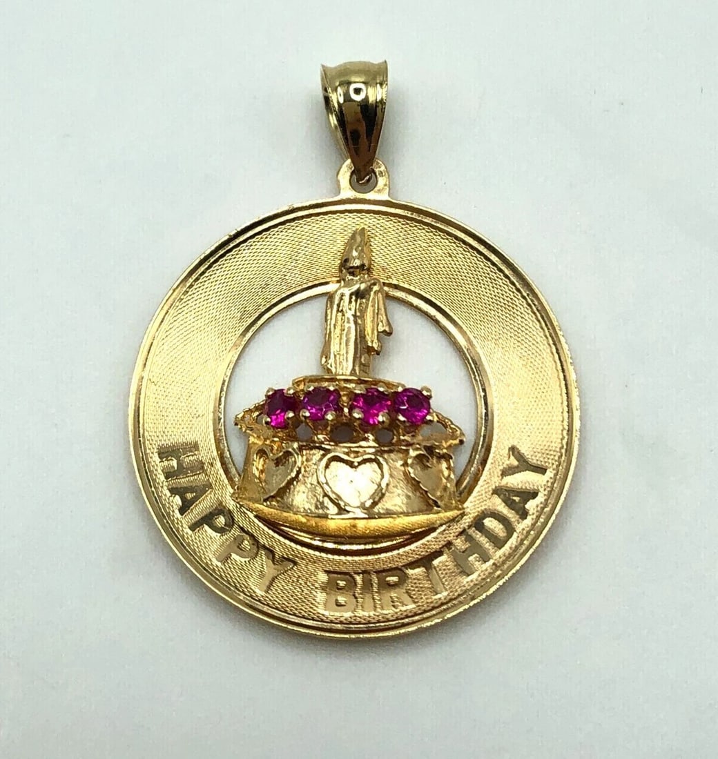 14K HAPPY BIRTHDAY CAKE PENDANT WITH SYNTHETIC RUBIES 4.2G: 14K HAPPY BIRTHDAY CAKE PENDANT WITH SYNTHETIC RUBIES 4.2G 14k Happy Birthday Cake Pendant with Synthetic Rubies You are bidding on a 14k Happy Birthday Cake Pendant with Synthetic Rubies. The pendant