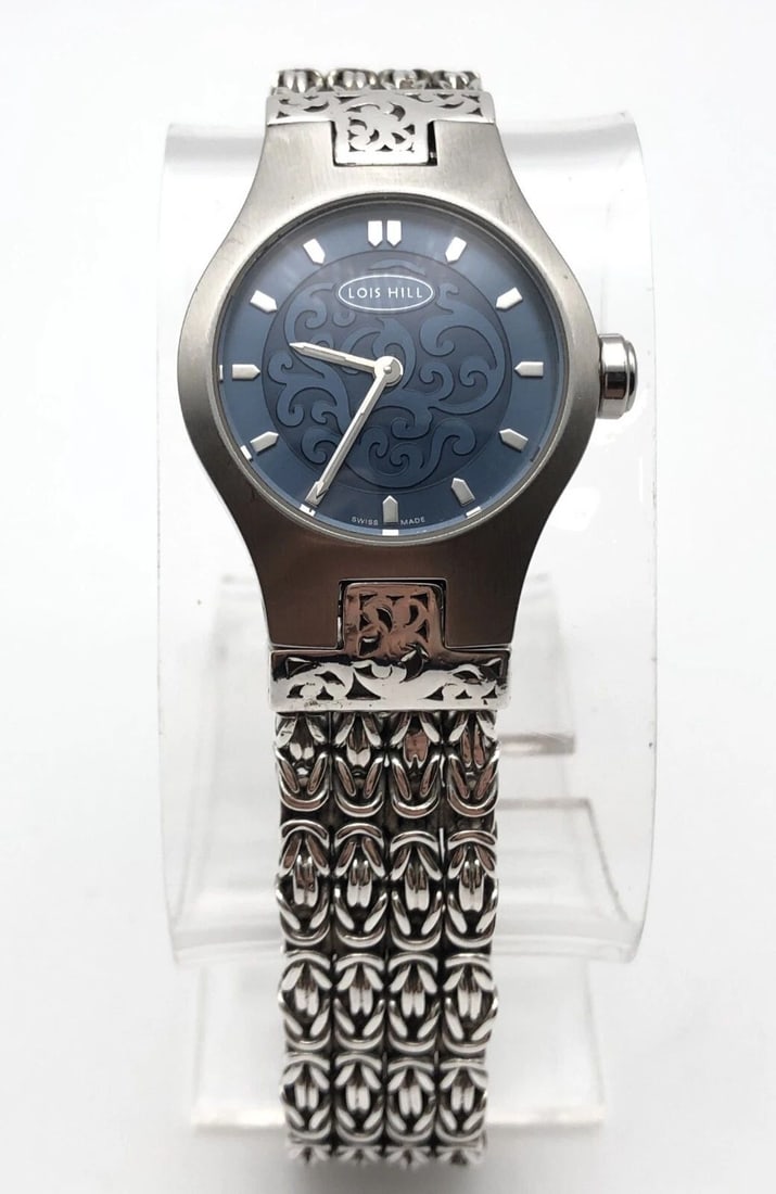 WOMAN'S LOIS HILL STEEL/925 WATCH WITH STERLING SILVER BAND AND BLUE DIAL: WOMAN'S LOIS HILL STEEL/925 WATCH WITH STERLING SILVER BAND AND BLUE DIAL Woman's Lois Hill Steel/925 Watch with Sterling Silver Band and Blue Dial You are bidding on a Woman's Lois Hill Steel/925 Wat