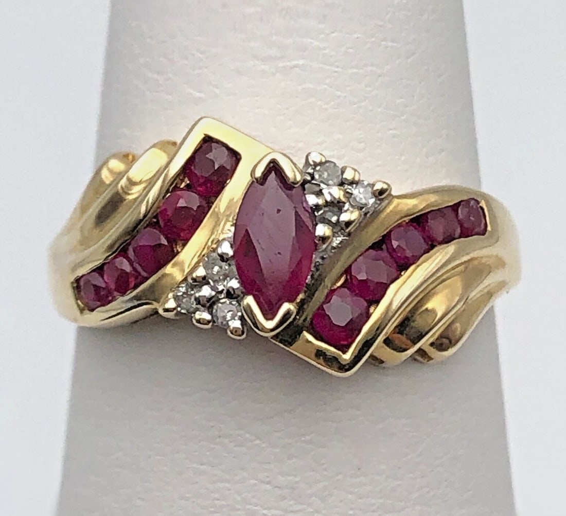 10K GOLD RING WITH 0.70CTS NATURAL RUBIES AND 0.06CTS OF DIAMONDS SIZE: 7 (1 of 2)