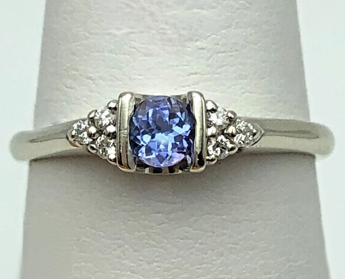 14K WHITE GOLD RING SET WITH TANZANITE AND 0.06CTS OF DIAMONDS SIZE: 8.25 (1 of 2)