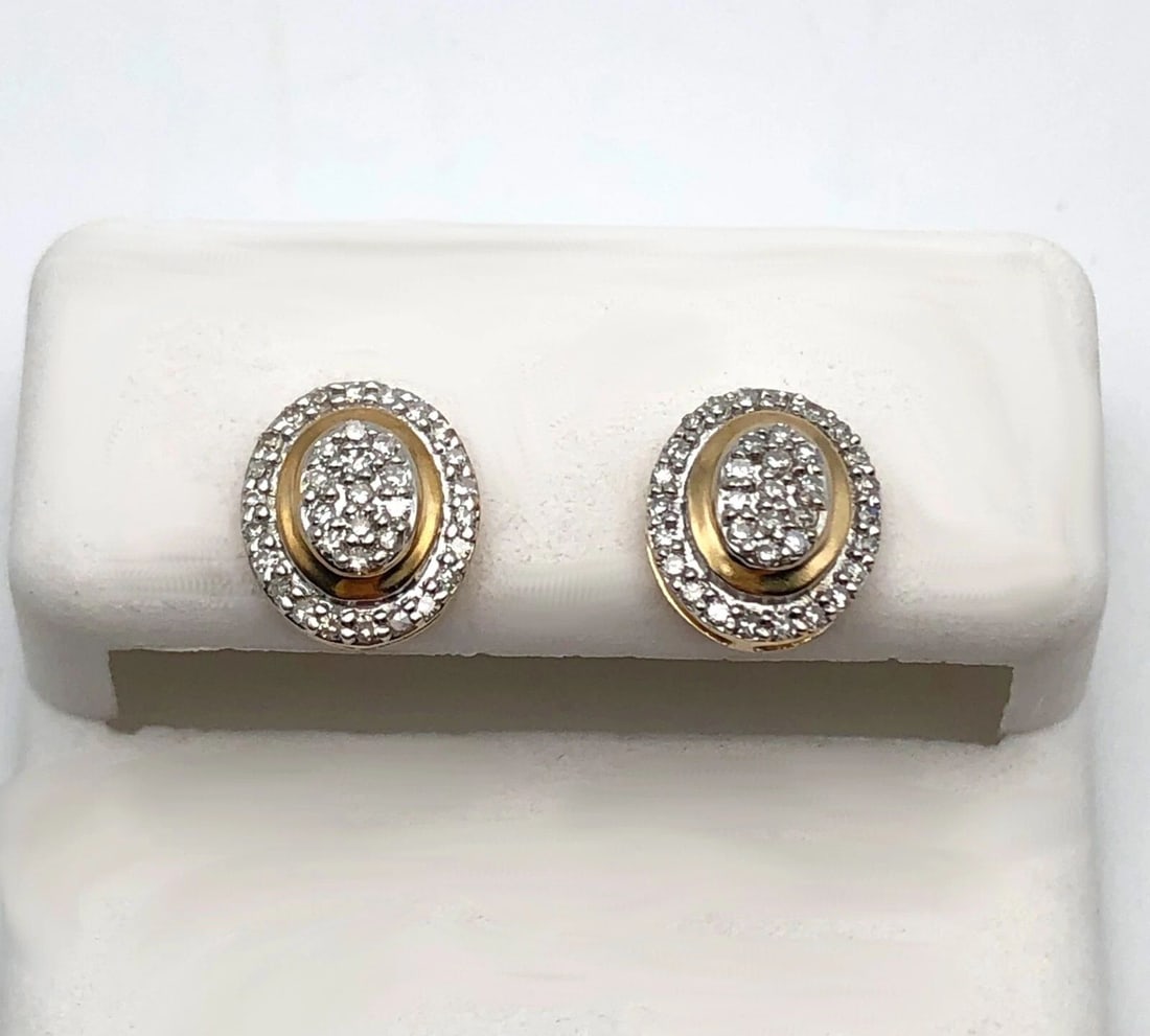 OVAL SHAPED 10K YELLOW GOLD EARRINGS WITH 0.20CTW OF DIAMONDS (1 of 2)
