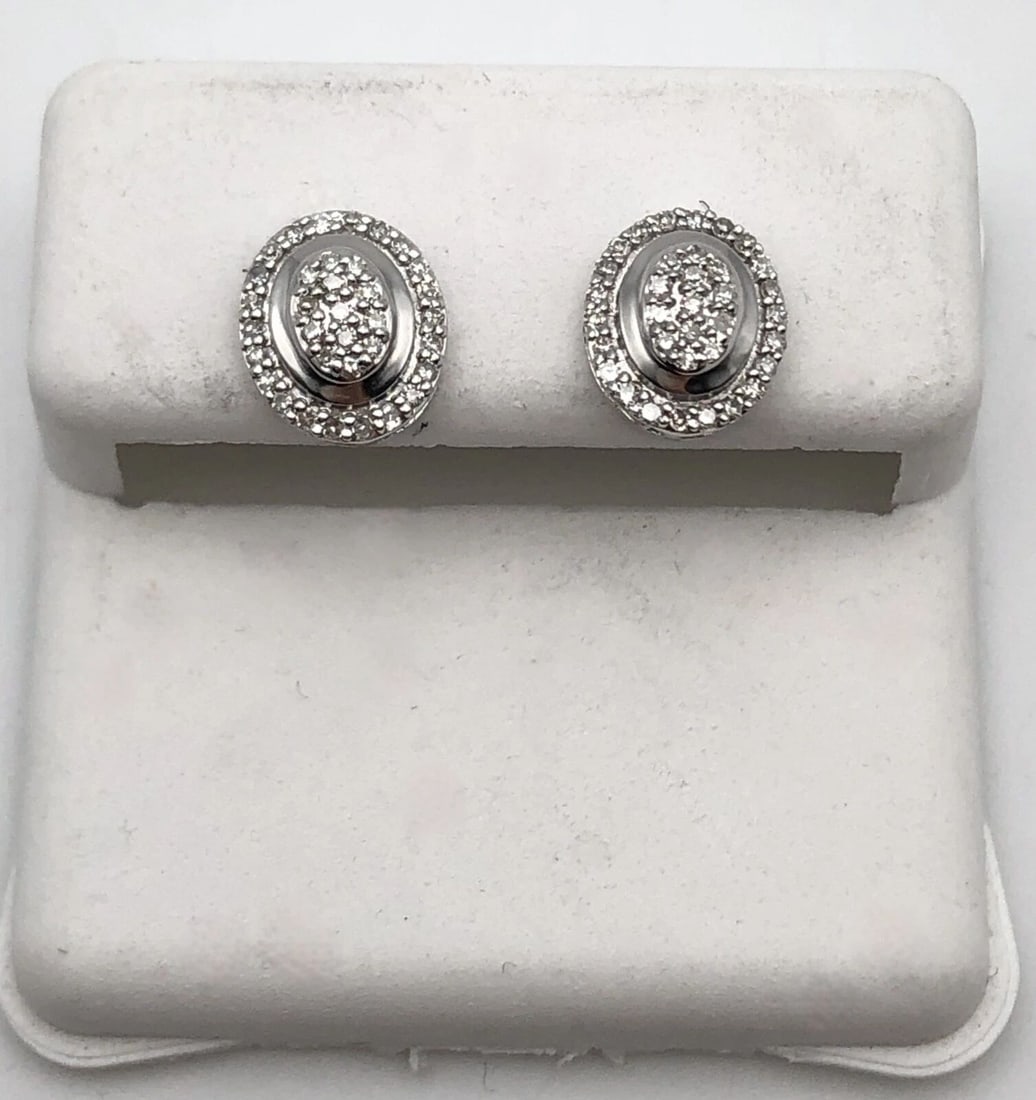 OVAL SHAPED 10K WHITE GOLD EARRINGS WITH 0.20CTW OF DIAMONDS (1 of 2)