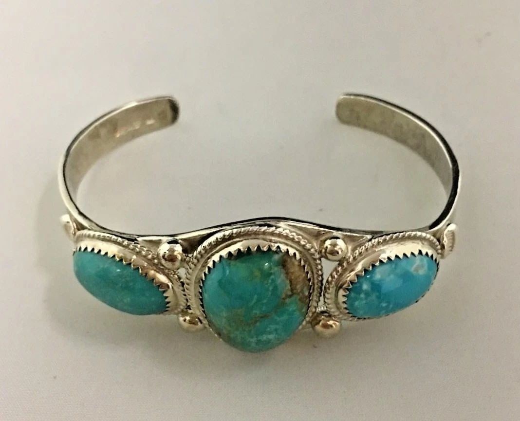 STERLING SILVER CUFF WITH TURQUOISE STONES (1 of 2)