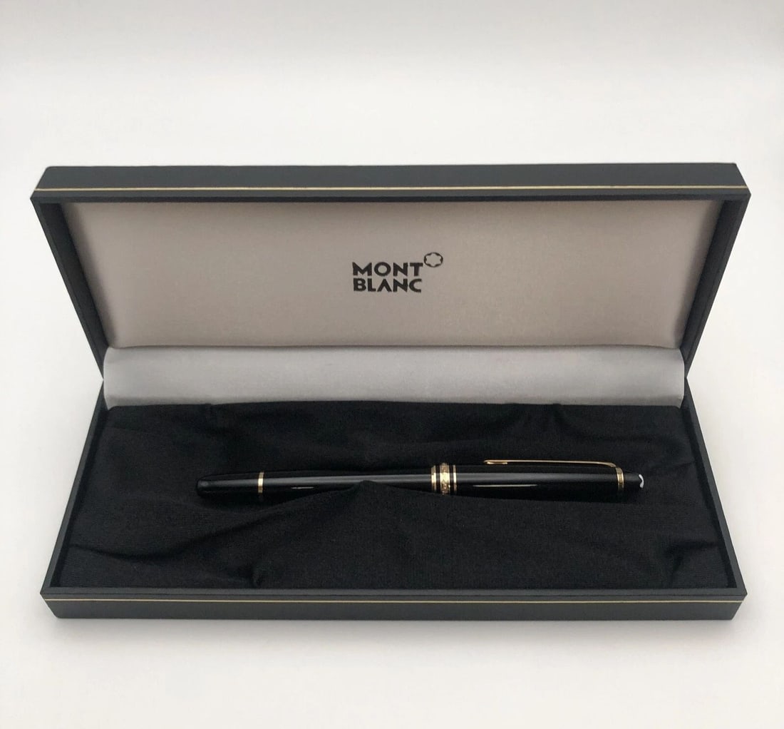 MONT BLANC BLACK PEN WITH GOLD COLORED TRIM AND ORIGINAL CASE (1 of 2)