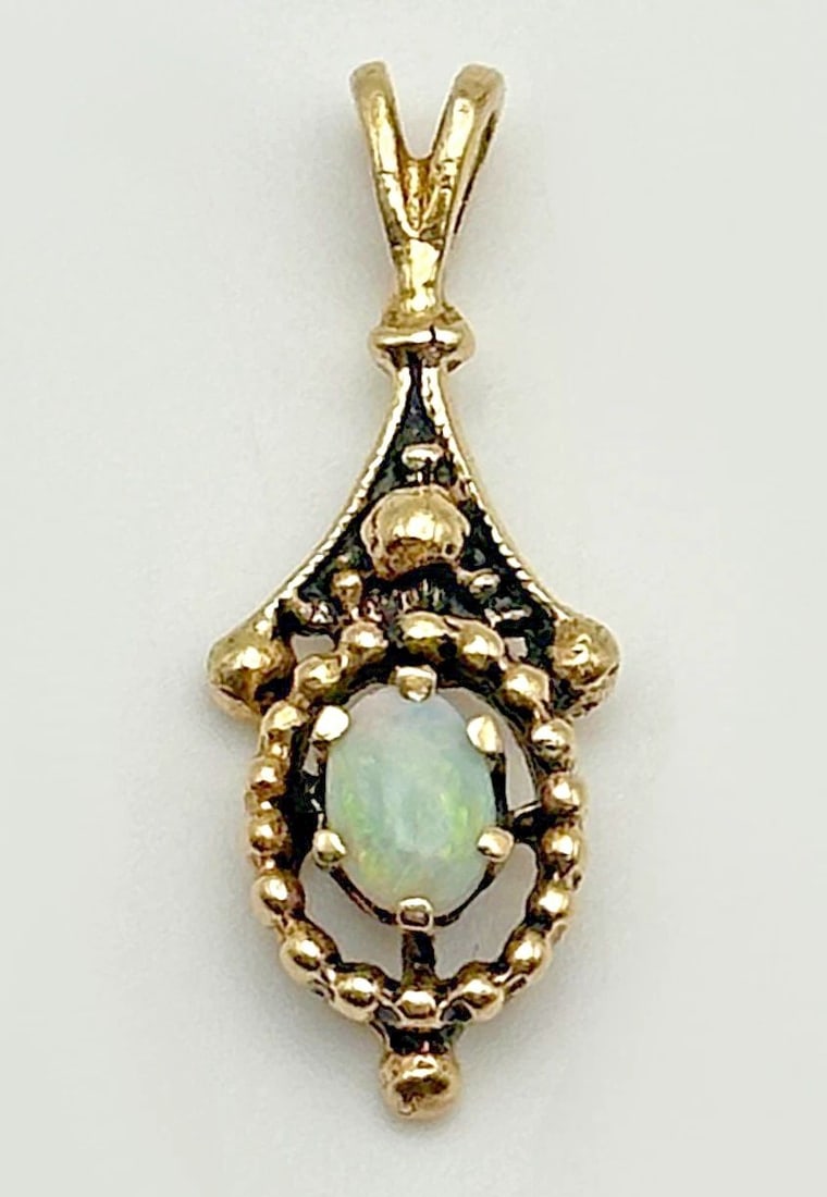 14K GOLD PENDANT WITH NATURAL OPAL AND BEAUTIFUL BLACK ANTIQUING 1.4 GRAMS (1 of 2)