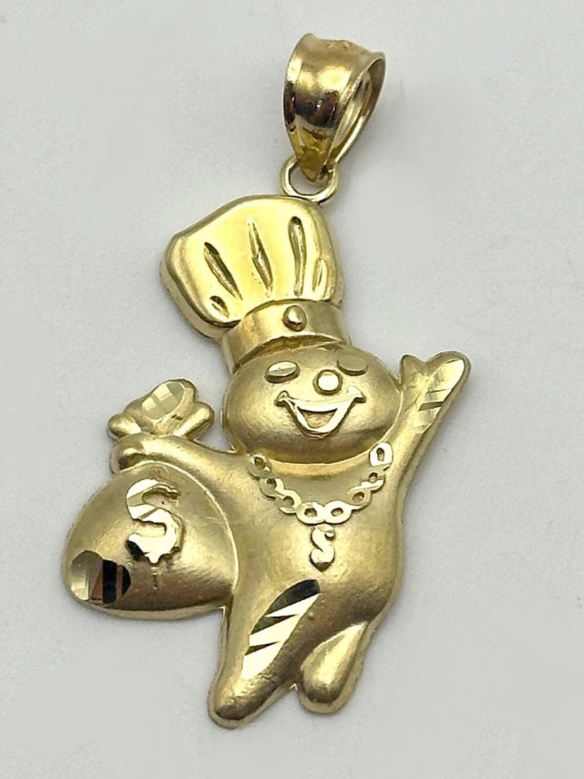 10K GOLD DOUGH BOY WITH MONEY BAG PENDANT 1.7 GRAMS: 10k Gold Dough Boy with Money Bag Pendant 1.7 grams Condition: Brand New, Display Model. Refer to condition description above and pictures. Material: 10k Yellow Gold Pendant Size: 20mm wide, 25mm tall