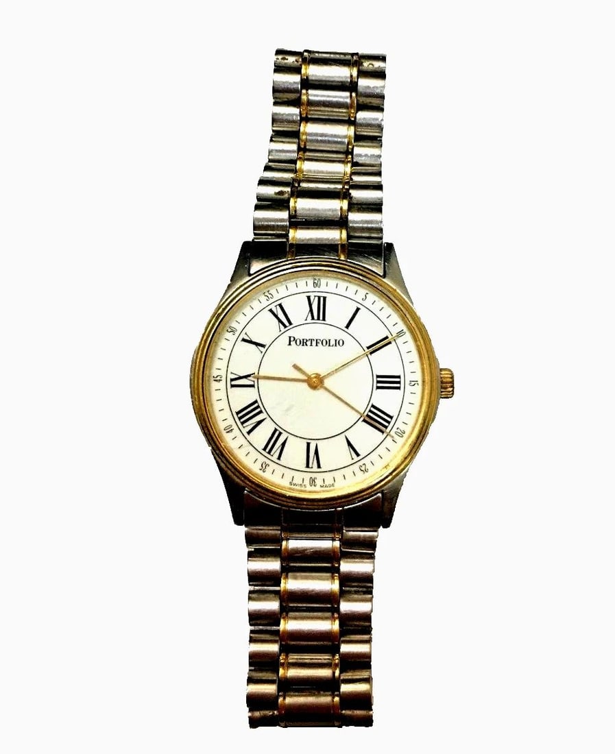 PORTFOLIO WATCH, SWISS MADE, TWO TONE, UNISEX 33MM CASE: PORTFOLIO WATCH TWO TONE Portfolio Watch silver and gold color You are bidding on a pre-owned Portfolio Watch silver and gold color. The watch is in excellent working condition. There are scratches on
