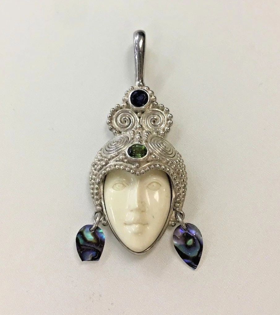 SAJEN STERLING SILVER FACE PENDANT WITH TINY SHELLS (1 of 2)