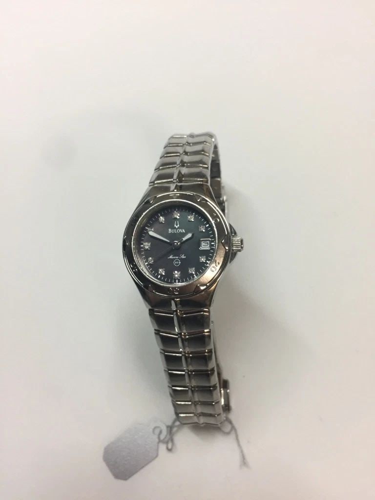 BULOVA 96P12 LADIES WATCH BLACK MOTHER OF PEARL MARINE STAR DIAMONDS: BULOVA 96P12 LADIES WATCH BLACK MOTHER OF PEARL MARINE STAR DIAMONDS Bulova 96P12 Ladies Watch Black Mother Of Pearl Marine Star Diamonds You are bidding on a pre-owned Bulova 96P12 Ladies Watch Black