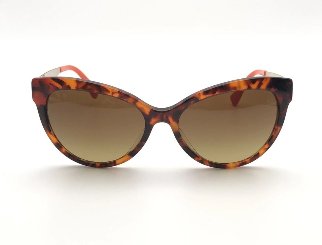 VERSACE VE 4338 SUNGLASSES BROWN TORTOISE SHELL, GOLD TONED, ORANGE ENDS: VERSACE VE 4338 SUNGLASSES BROWN TORTOISE SHELL, GOLD TONED, ORANGE ENDS Versace VE 4338 Sunglasses Brown Tortoise Shell, Gold Toned, Orange Ends You are bidding on a Versace VE 4338 Sunglasses Brown