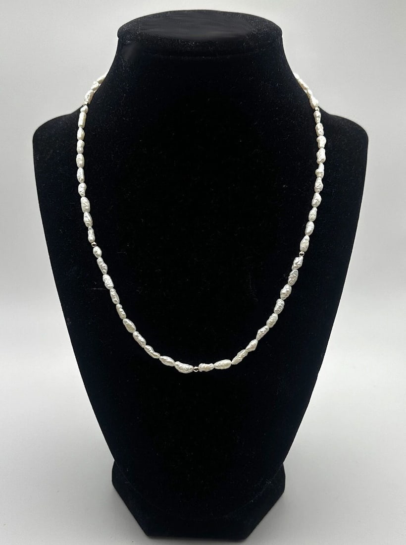 FRESH WATER PEARL NECKLACE WITH 14K GOLD BEADS AND CLASP 18" 3.5MM: Fresh Water Pearl Necklace with 14k Gold Beads and Clasp Condition: Used Material: 14k Yellow Gold for the clasp ends as well as the five 2.5mm sized accented beads Necklace Size: 18 inches long, roug