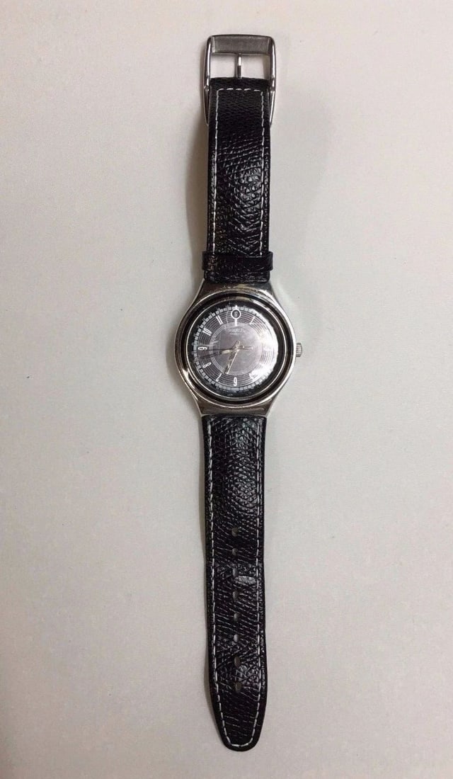 MEN'S SWATCH SWISS IRONY: MEN'S SWATCH SWISS IRONY Men's Swatch Swiss Irony You are bidding on a pre-owned Men's Swatch Swiss Irony watch. The watch is in excellent working condition. There are few minor scratches on the watch