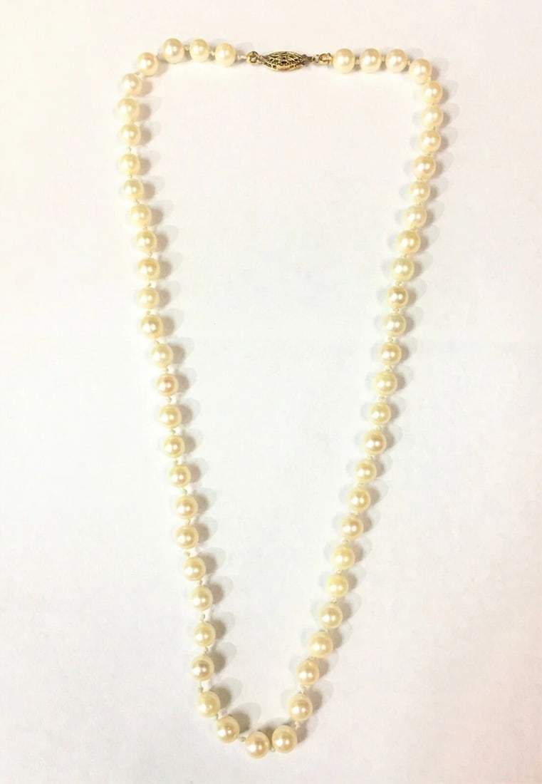 WHITE PEARL NECKLACE WITH GOLD FILLED CLASP (18.5" INCHES LONG): WHITE PEARL NECKLACE WITH GOLD FILLED CLASP (18.5" INCHES LONG) White Pearl Necklace with Gold Filled Clasp You are bidding on a White Pearl Necklace with Gold Filled Clasp. The necklace and pearls ha