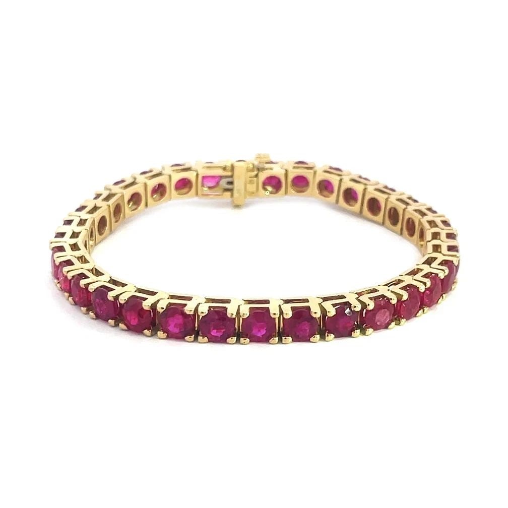 BURMESE RUBIES GOLD TENNIS BRACELET 18K YELLOW 14CT GIA: BURMESE RUBIES GOLD TENNIS BRACELET 18K YELLOW 14CT GIA BURMESE RUBIES GOLD TENNIS BRACELET 18K YELLOW 14CT GIA This is a magnificent tennis bracelet, crafted from 18k yellow gold with gorgeous round
