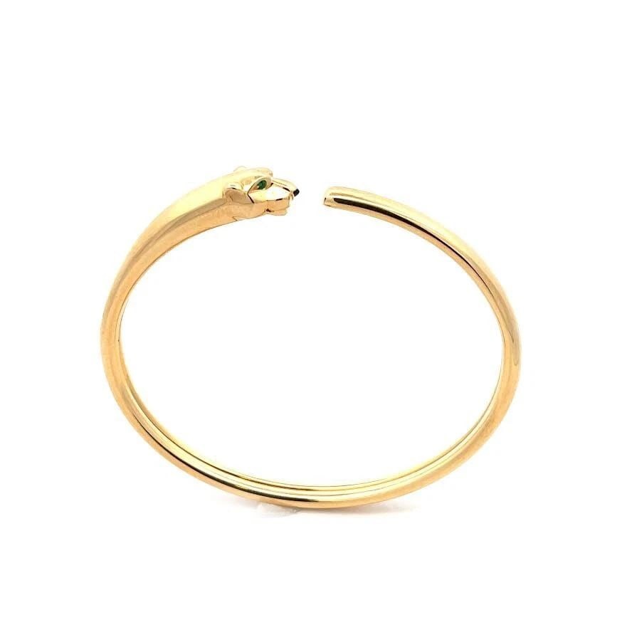 PANTHERE DE CARTIER BRACELET TSAVORITE ONYX 18K YELLOW GOLD CUFF BOX AND CERT: PANTHERE DE CARTIER BRACELET TSAVORITE ONYX 18K YELLOW GOLD CUFF BOX AND CERT PANTHERE DE CARTIER BRACELET TSAVORITE ONYX 18K YELLOW GOLD CUFF BOX AND CERT This exotic authentic Panthere de Cartier